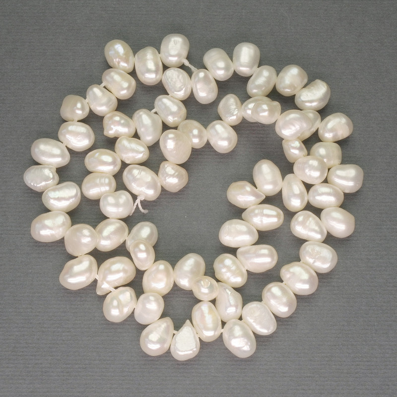 Річкові білі перлини овальні на нитці, діаметр 7х7-9мм+-на нитці, довжина 40см+