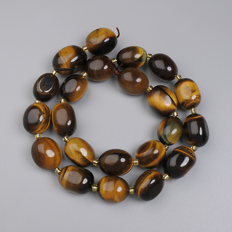 Намистини Тигрове Око галтівка, діаметр 14-17х12-12, 5мм+- бісер 3мм+- на нитці, довжина 40см+